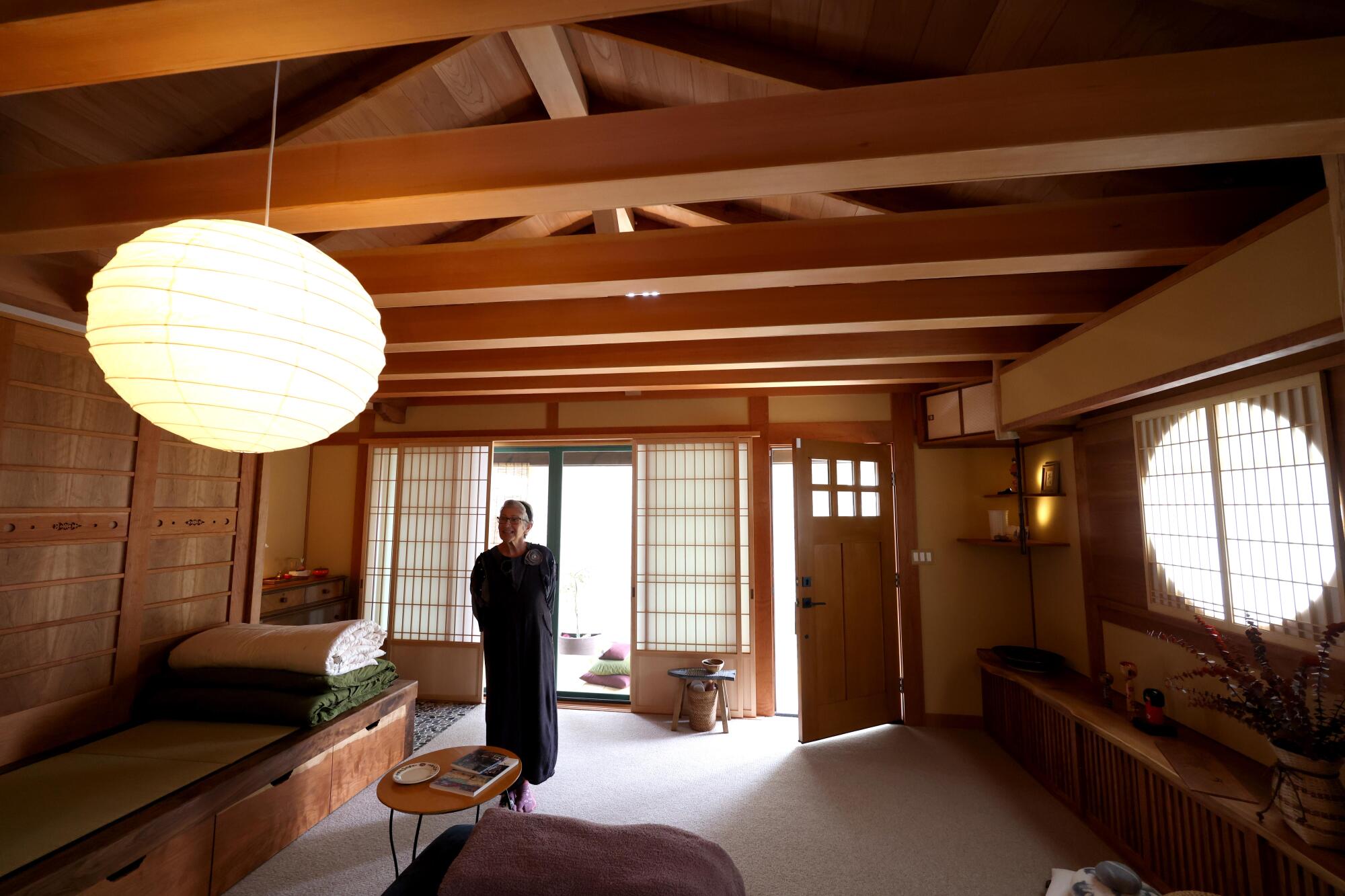 Lizabeth Altounian, 72, stands inside her Kyoto-style traditional Japanese ADU.