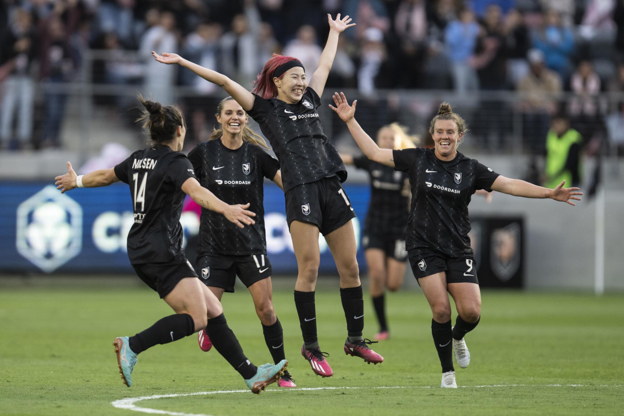 Angel City forward Jun Endo, center, celebrates during a match against NJ/NY Gotham in March 2023.