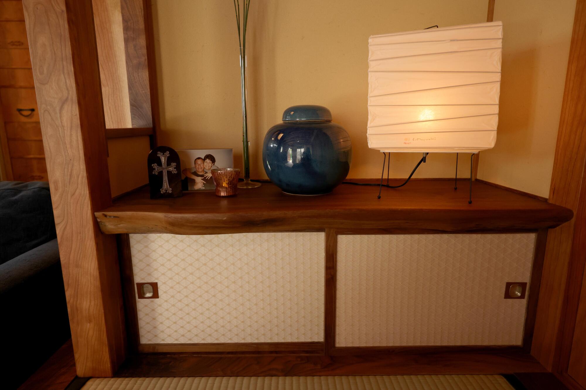 A custom cabinet in the bedroom area of a Japanese-style ADU.