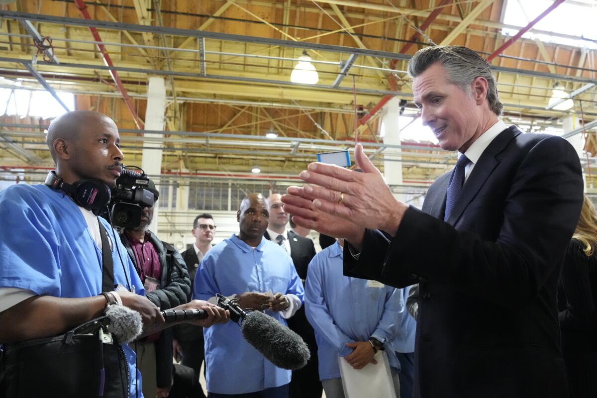 Gov. Gavin Newsom talks with incarcerated men at San Quentin State Prison in 2023.
