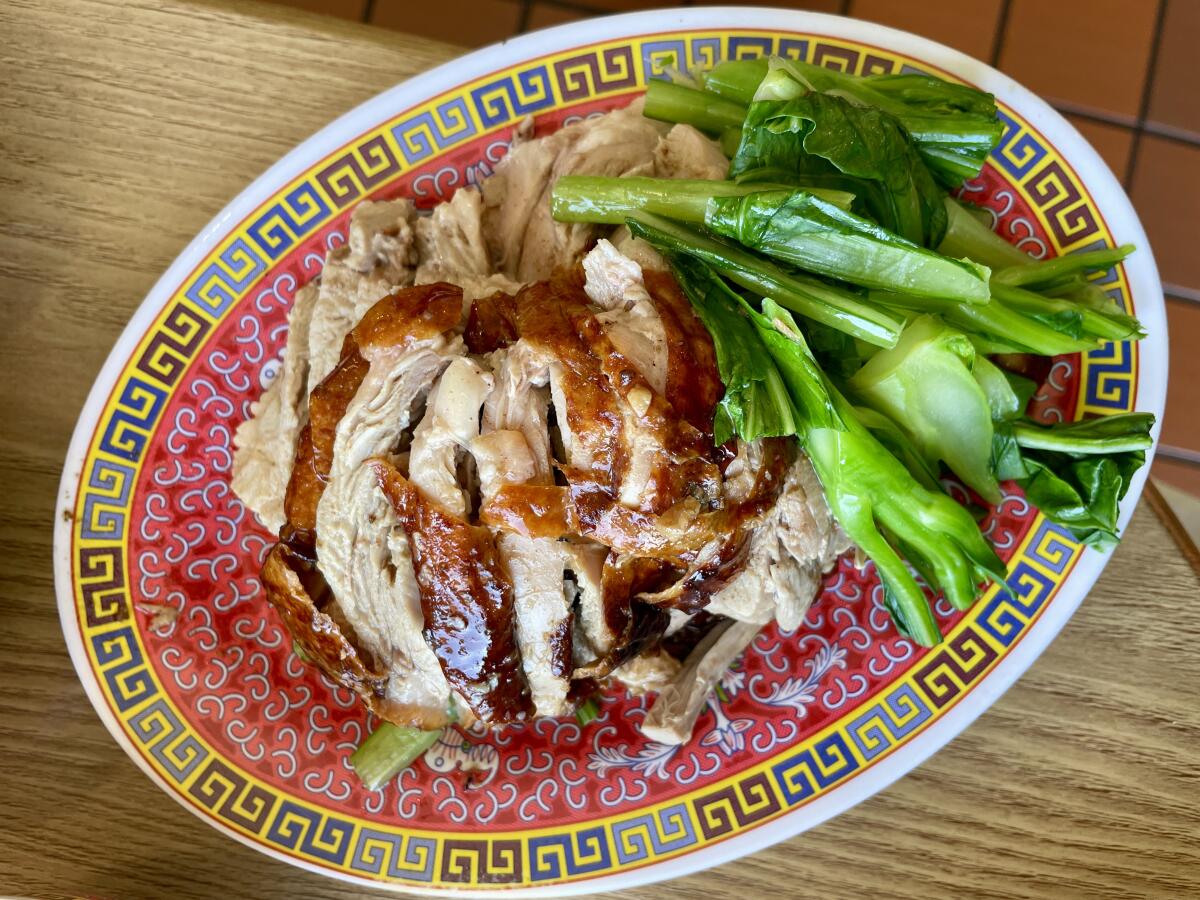 A plate of roast duck from Roasted Duck by Pa Ord.