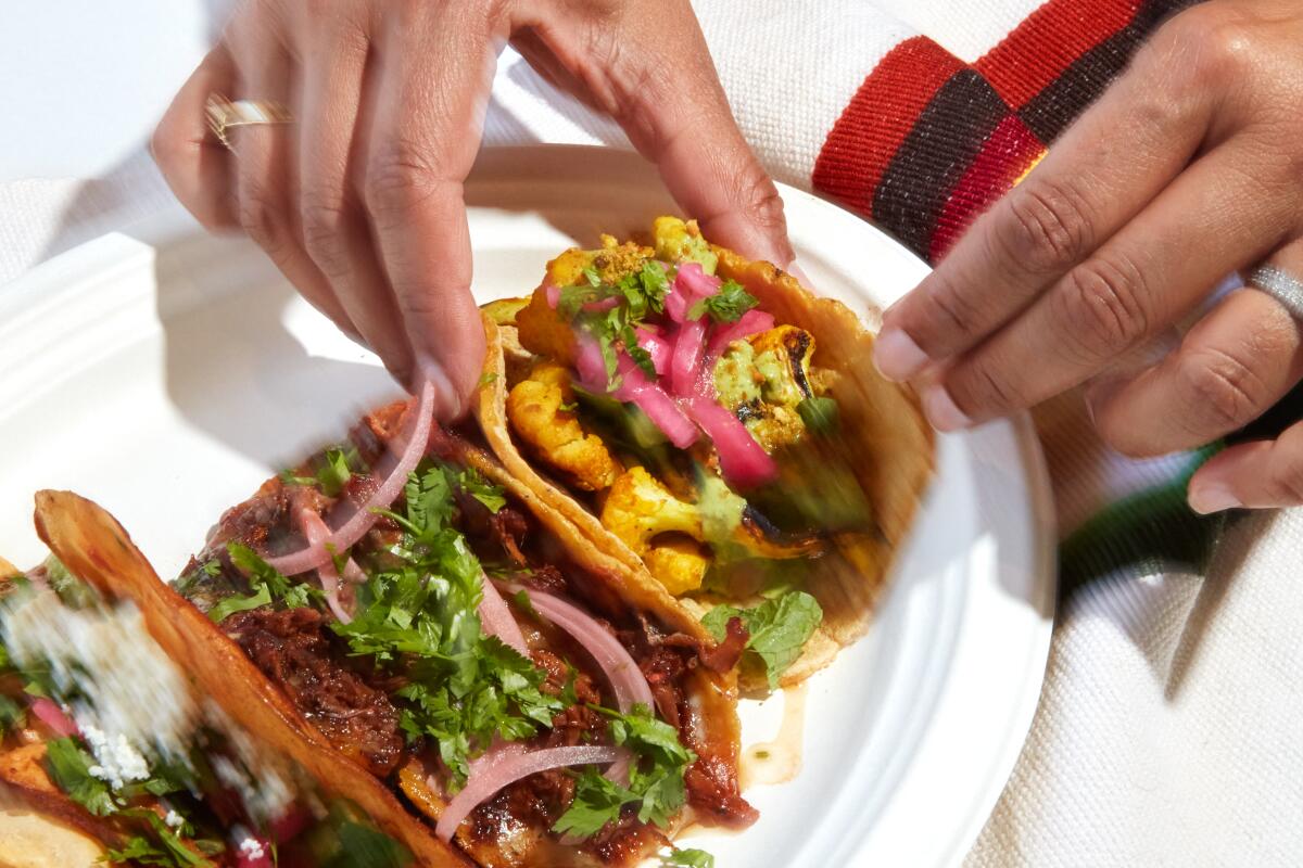A taco combo plate from Saucy Chick Goat Mafia