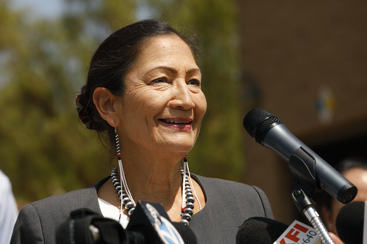 Interior Secretary Deb Haaland speaks to reporters in Irvine in 2022.